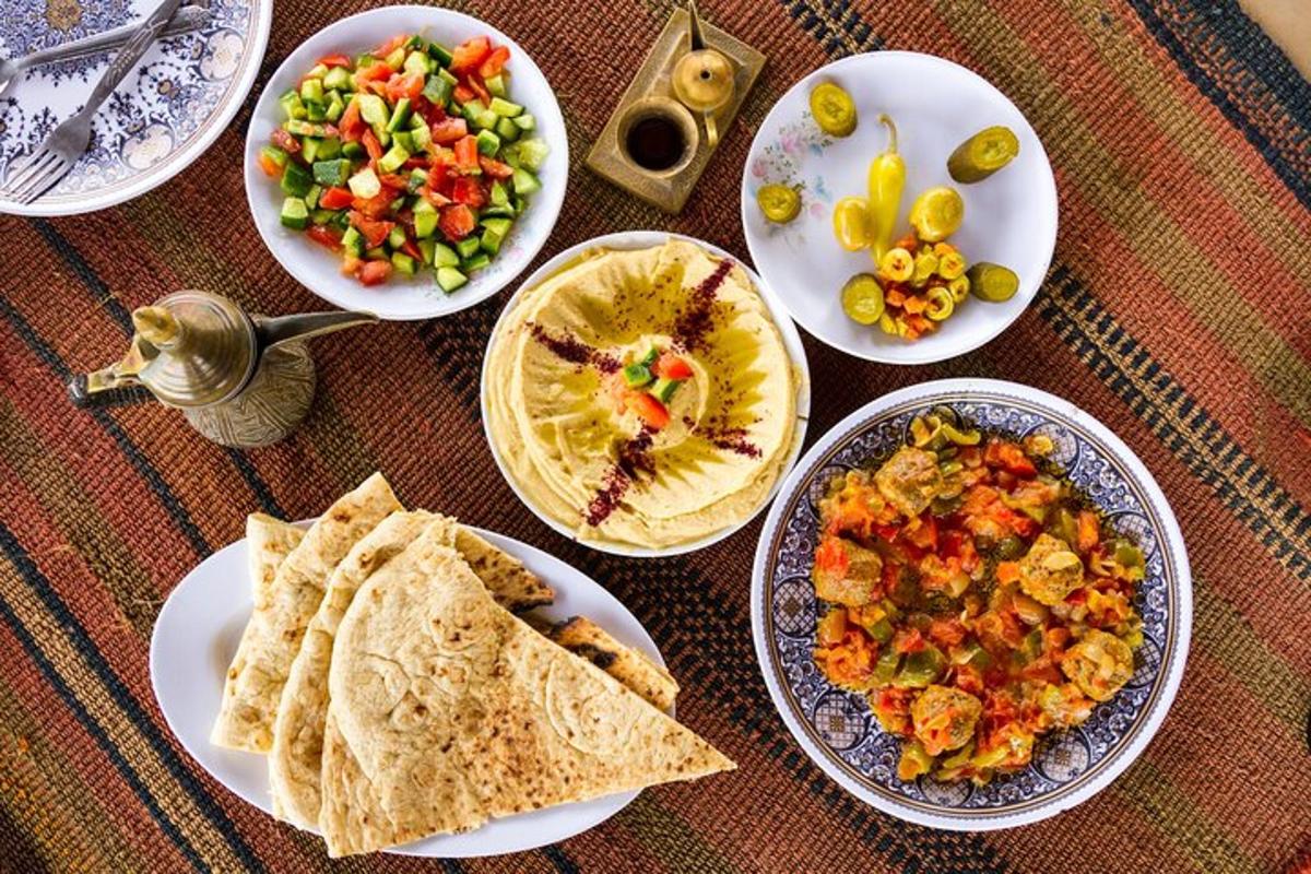 a table with plates of food on a table