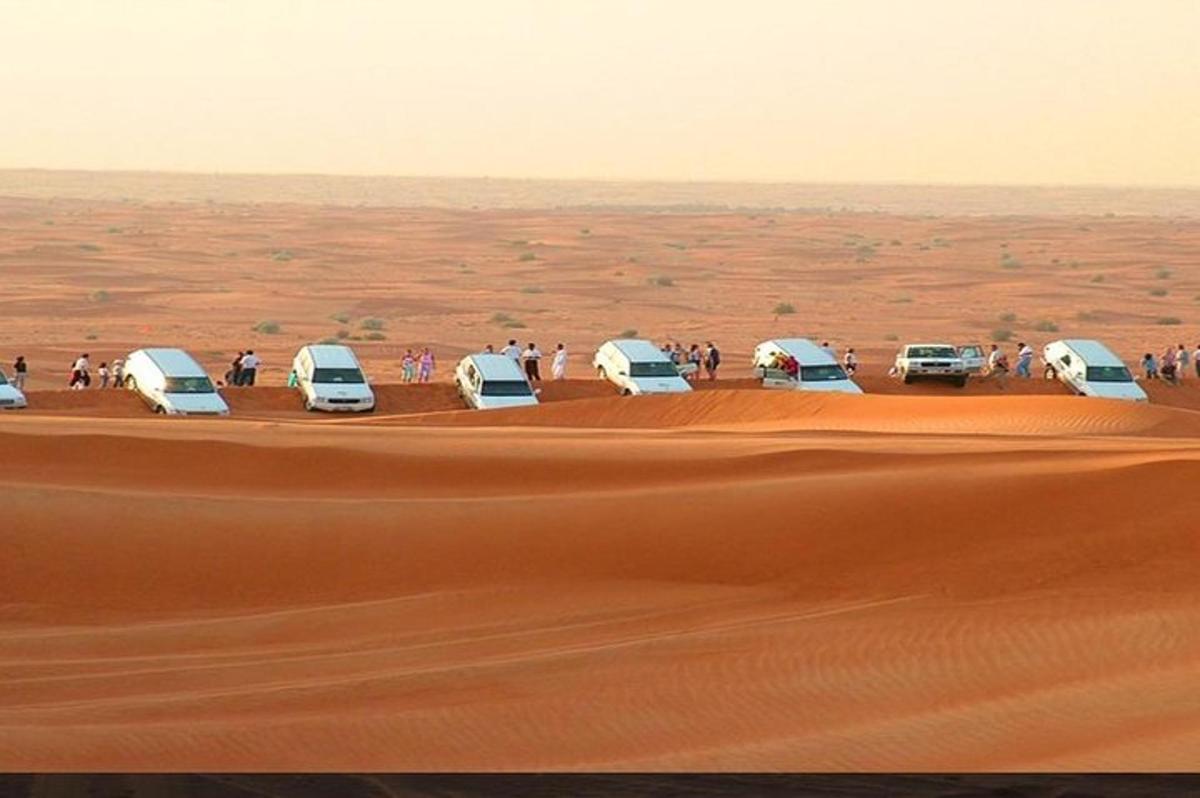 a group of cars parked in the desert