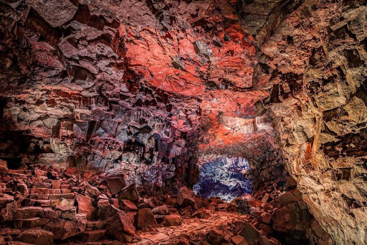 a wall of a cave with a stone wall