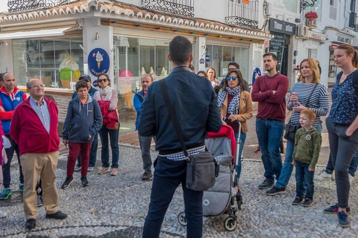 a group of people standing on a street