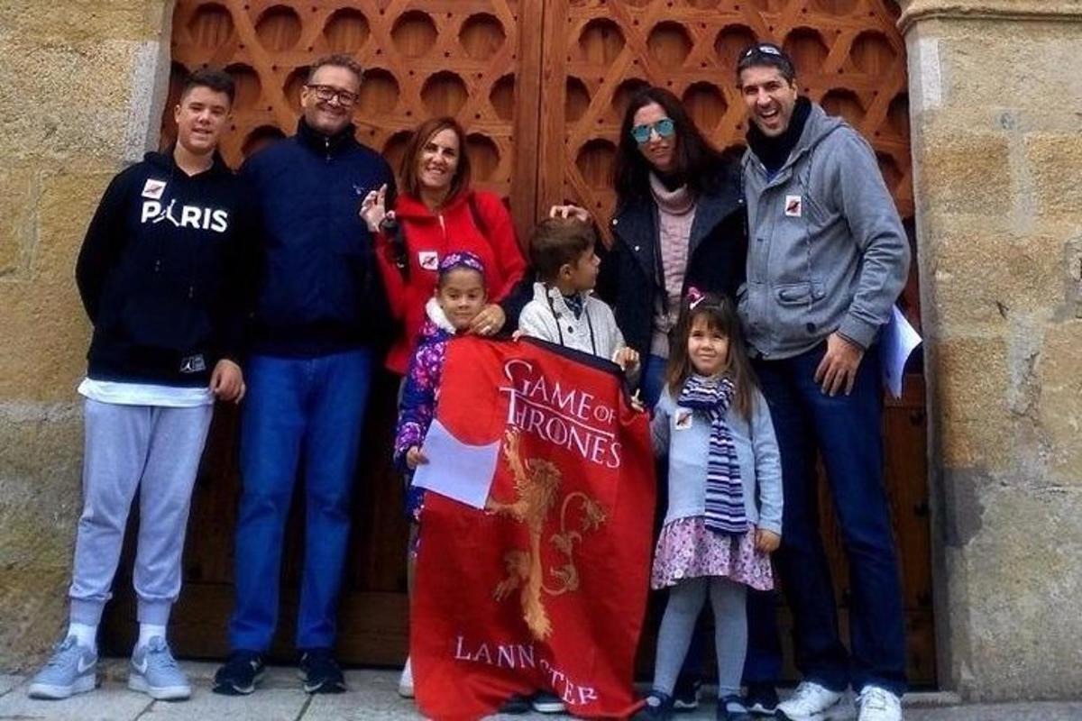 a group of people standing in front of a door