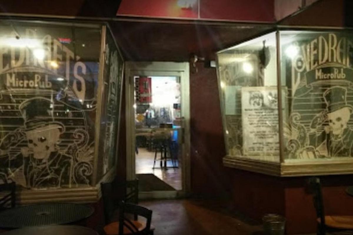 a room with a window with graffiti on it