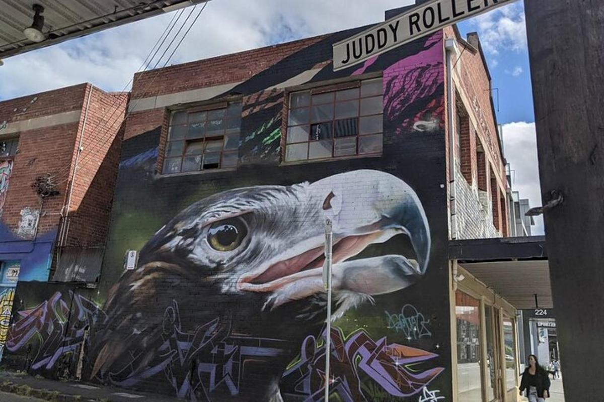 a painting of a fish on the side of a building