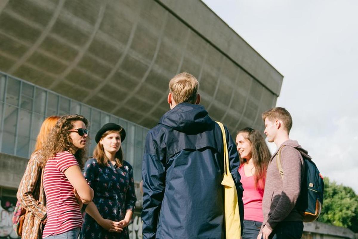 a group of people standing in front of a building
