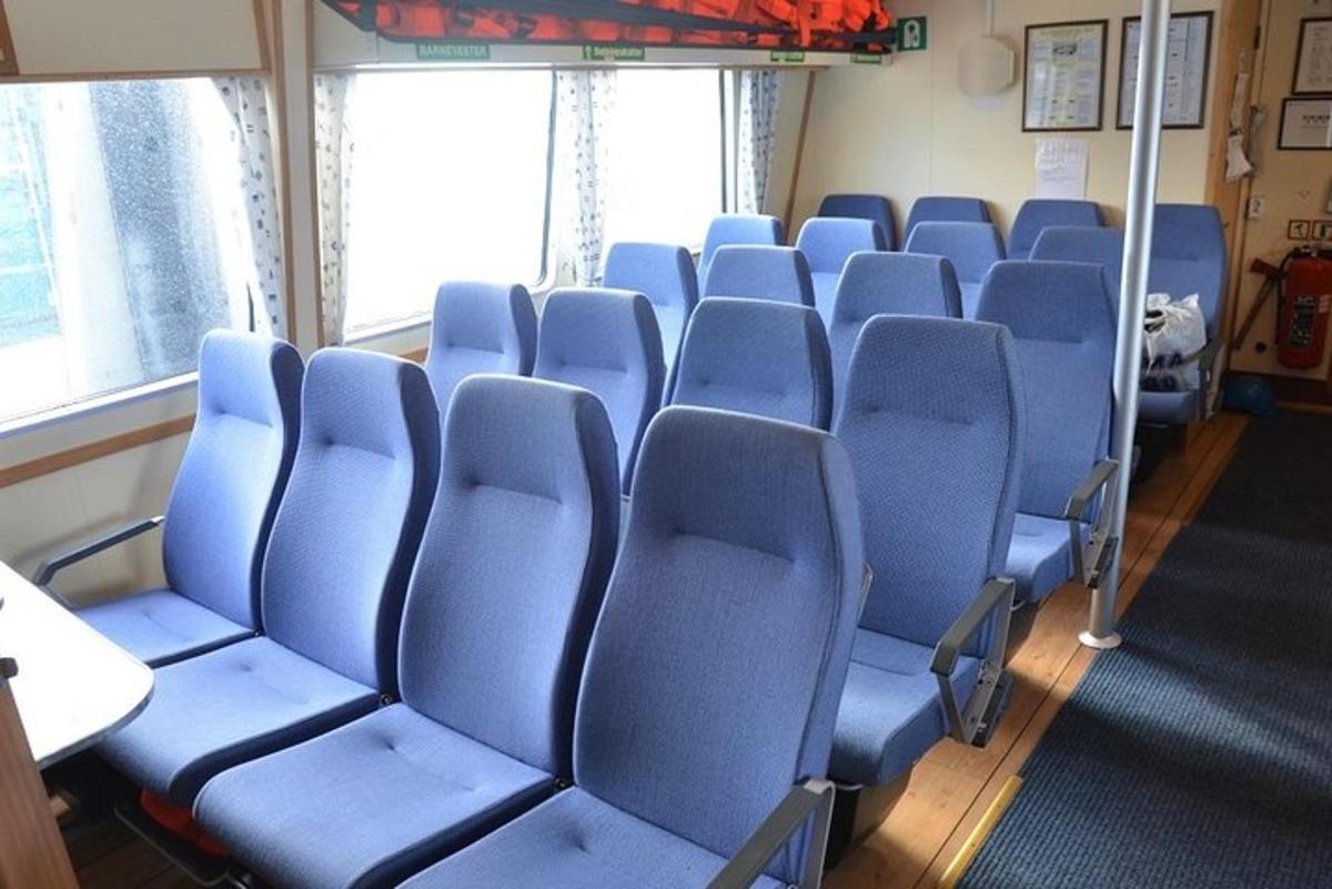 a row of blue chairs in a room