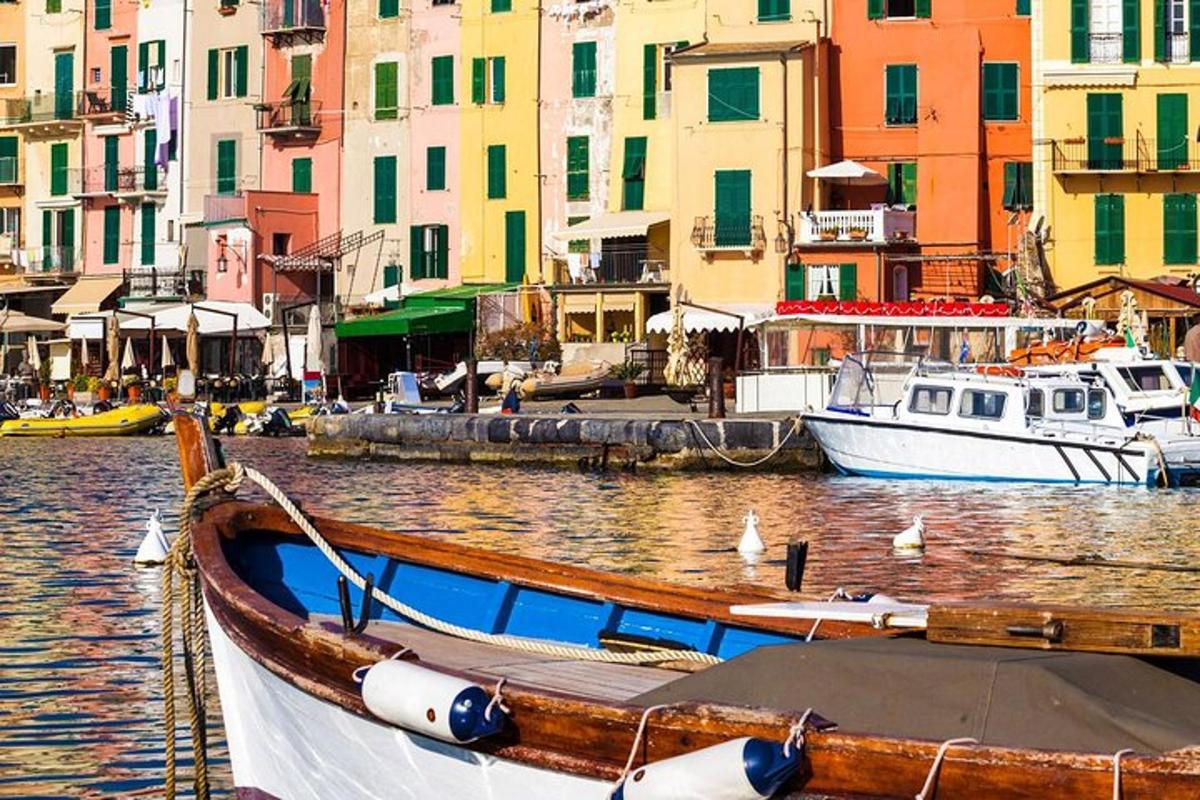 a boat is docked in a harbor with buildings