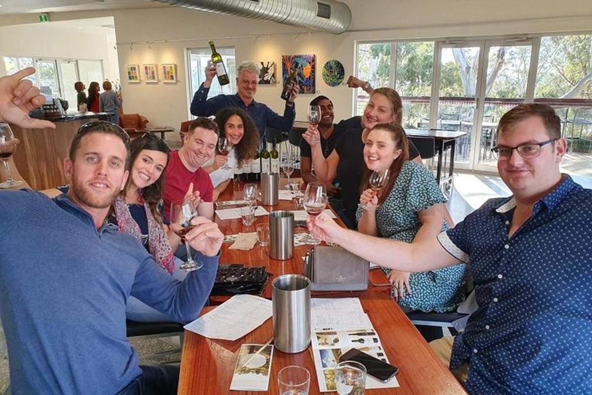 a group of people sitting around a table in a restaurant