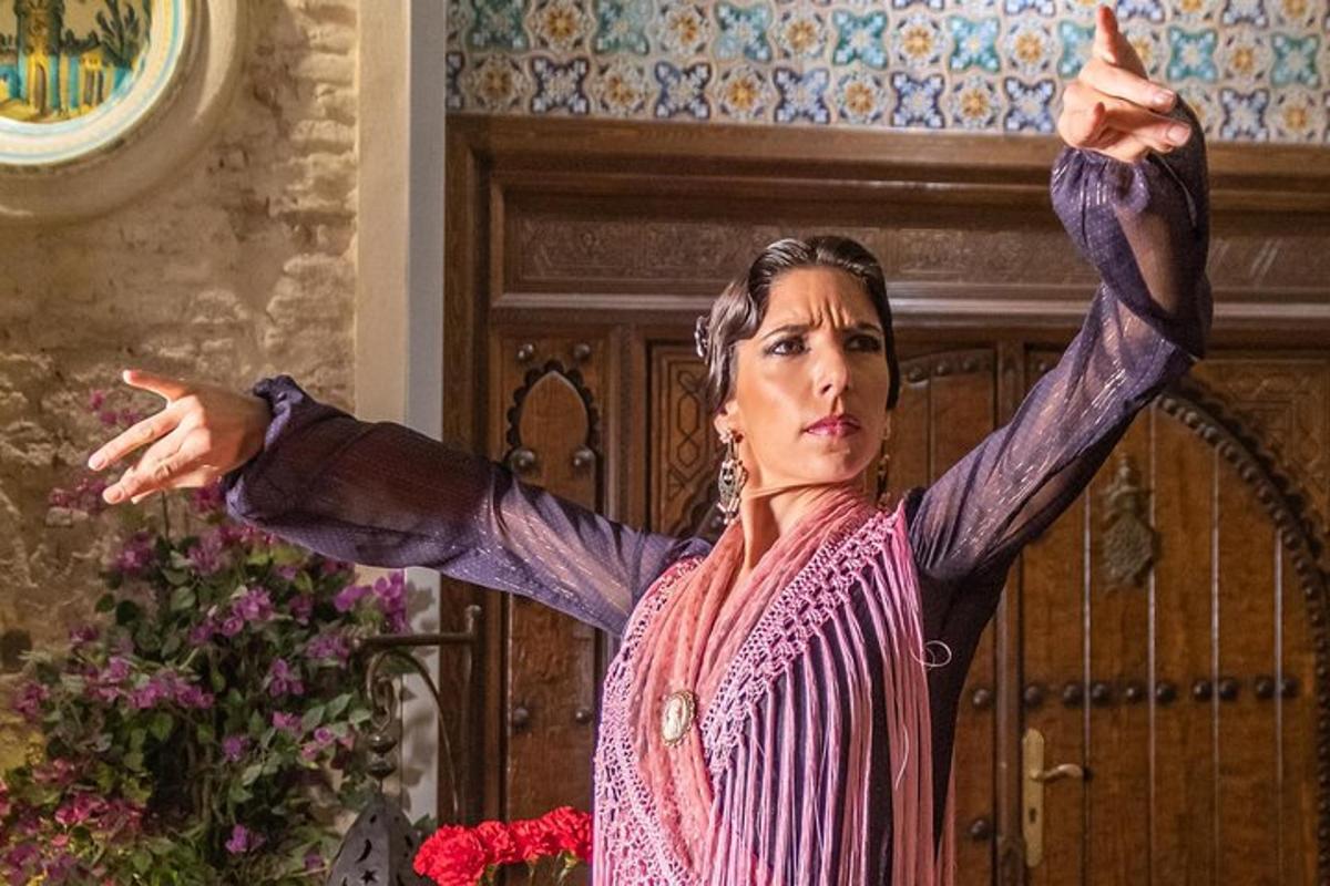 a woman standing with her arms in the air