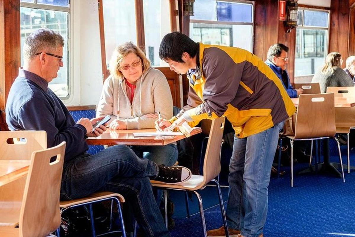 a group of people sitting at a table in a room