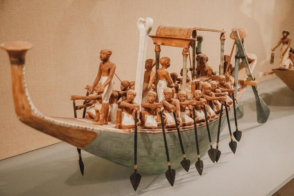 a wooden boat on display in a museum