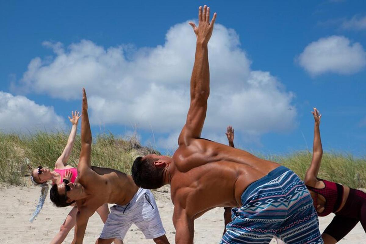 a group of men on the beach doing