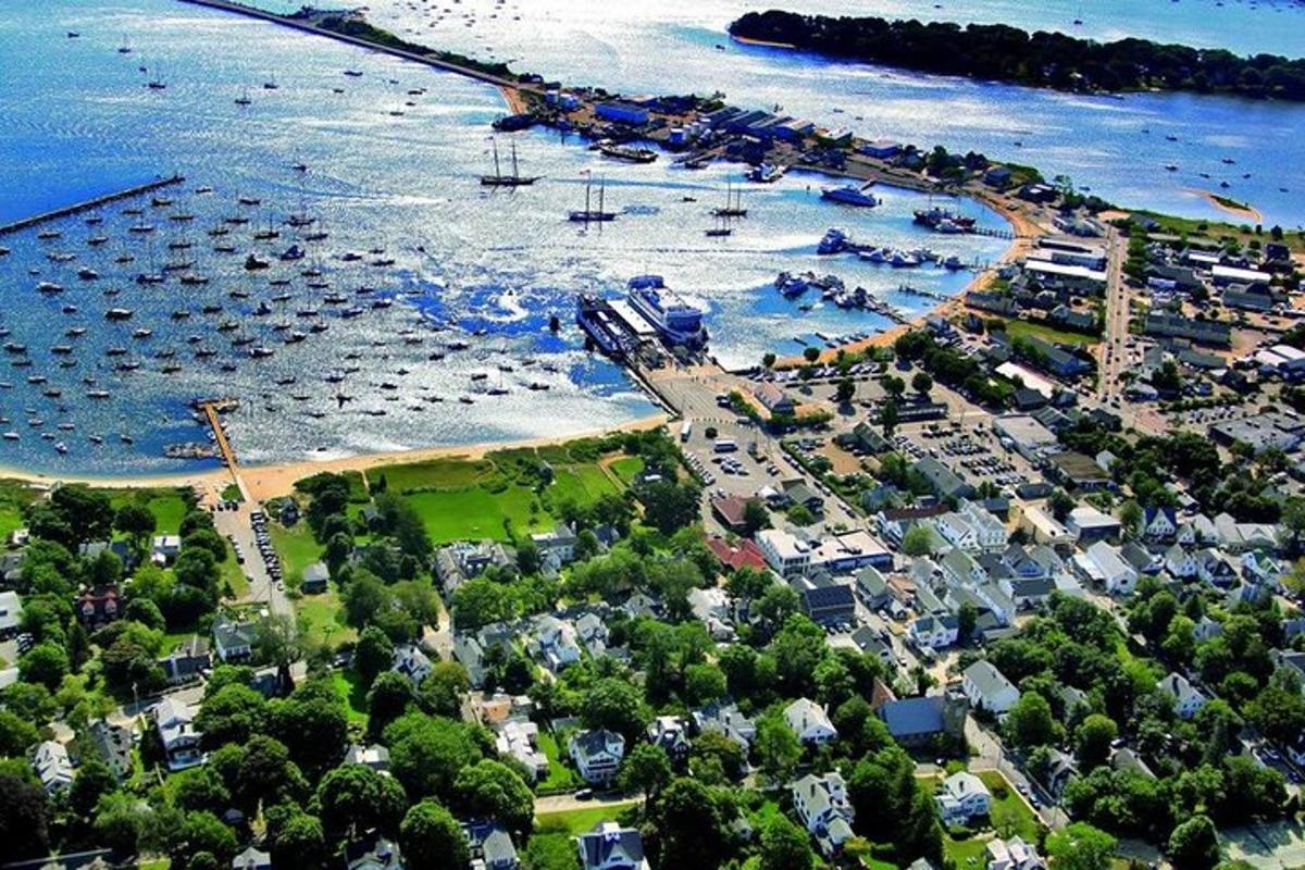 an aerial view of a harbor with boats in the water