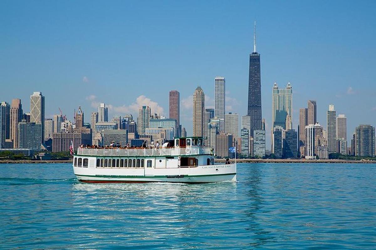 a boat on the water in front of a city