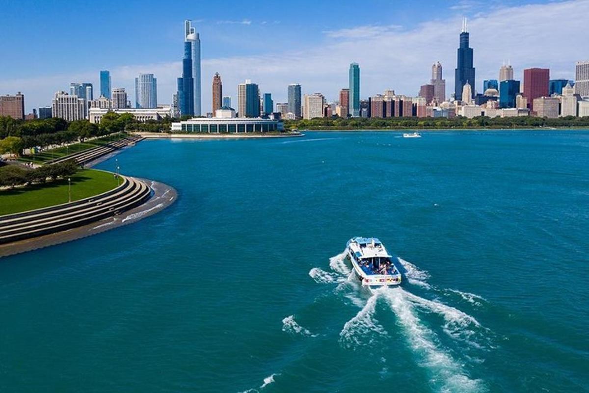 a boat on a river with a city in the background