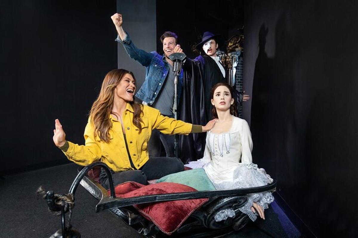 a group of people sitting in a wheel chair