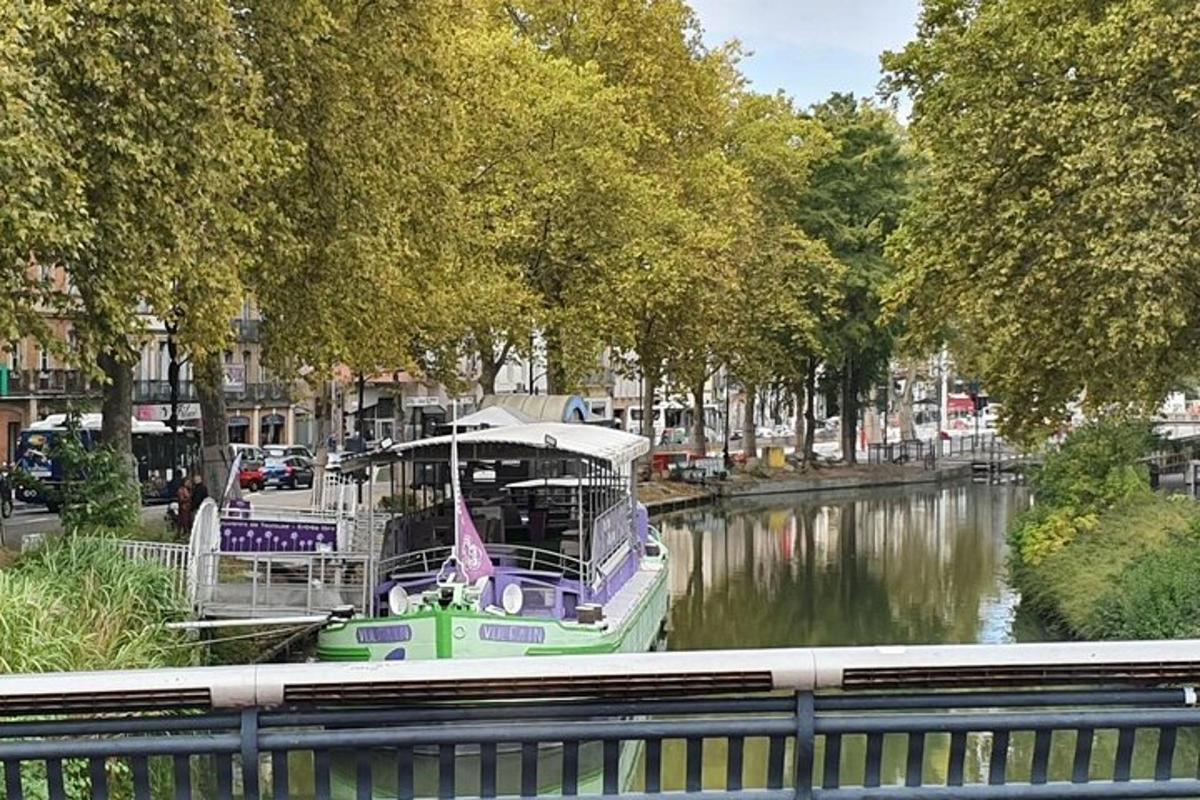 a boat is docked at a marina on a river