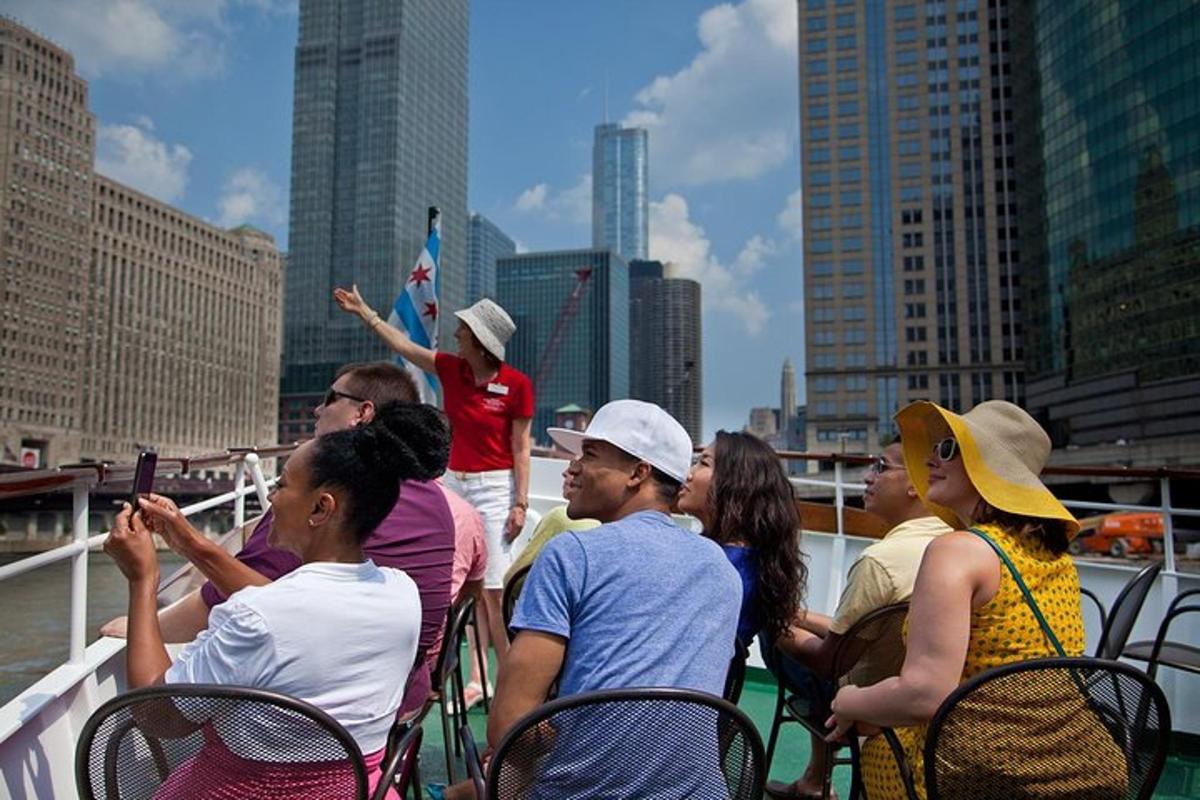 a group of people sitting on a boat in the water