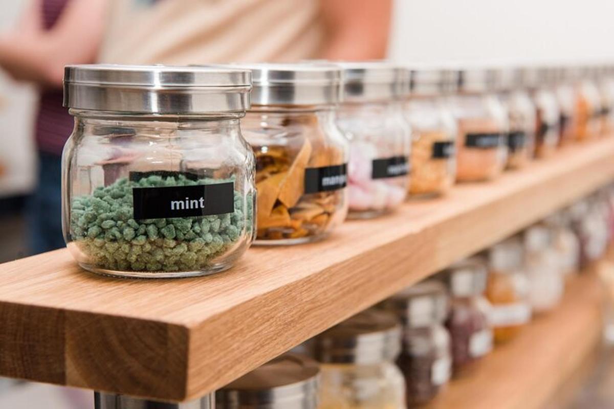 a row of jars of food on a shelf