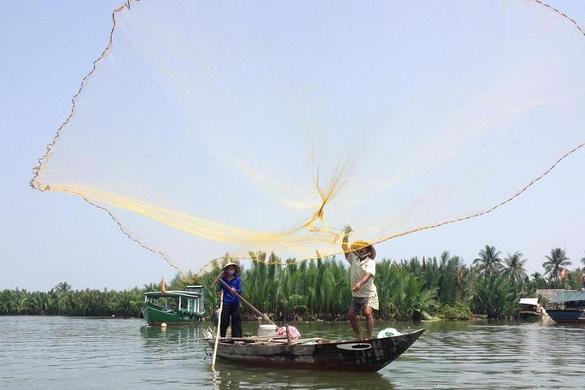 a couple of people on a boat in the water