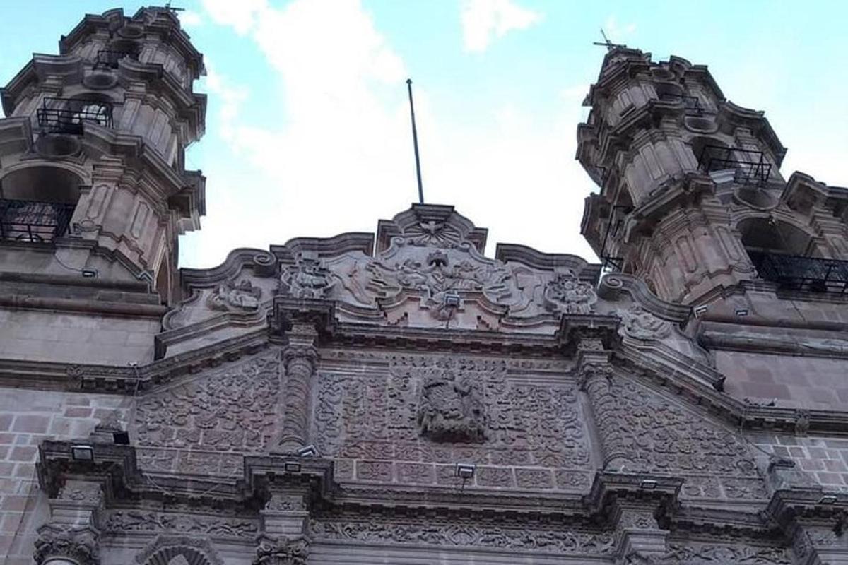 a building with two towers on top of it