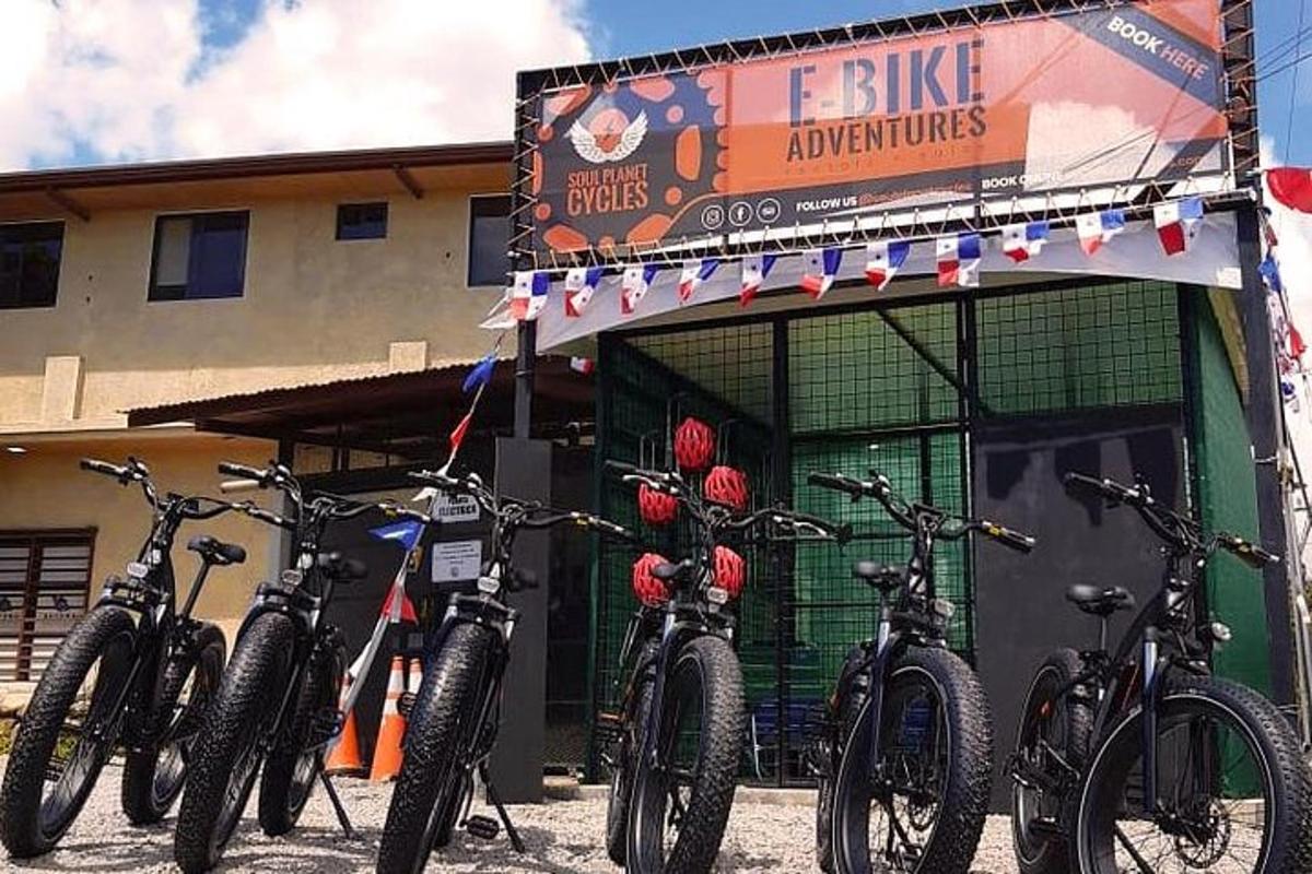 a group of bikes parked in front of a building