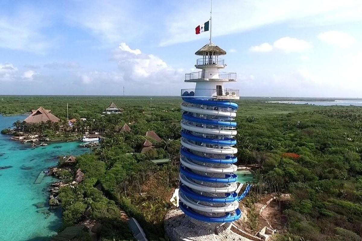 an island with a lighthouse in the middle of the ocean