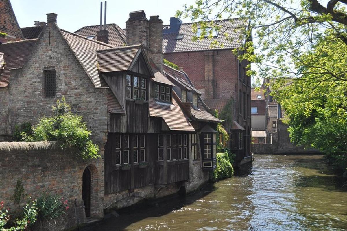 a group of buildings next to a river
