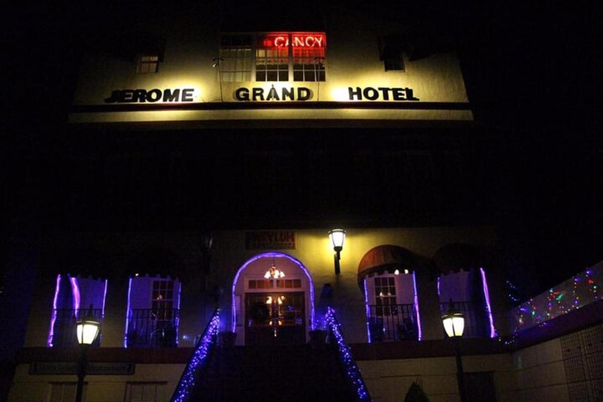 a building with a grand hotel at night