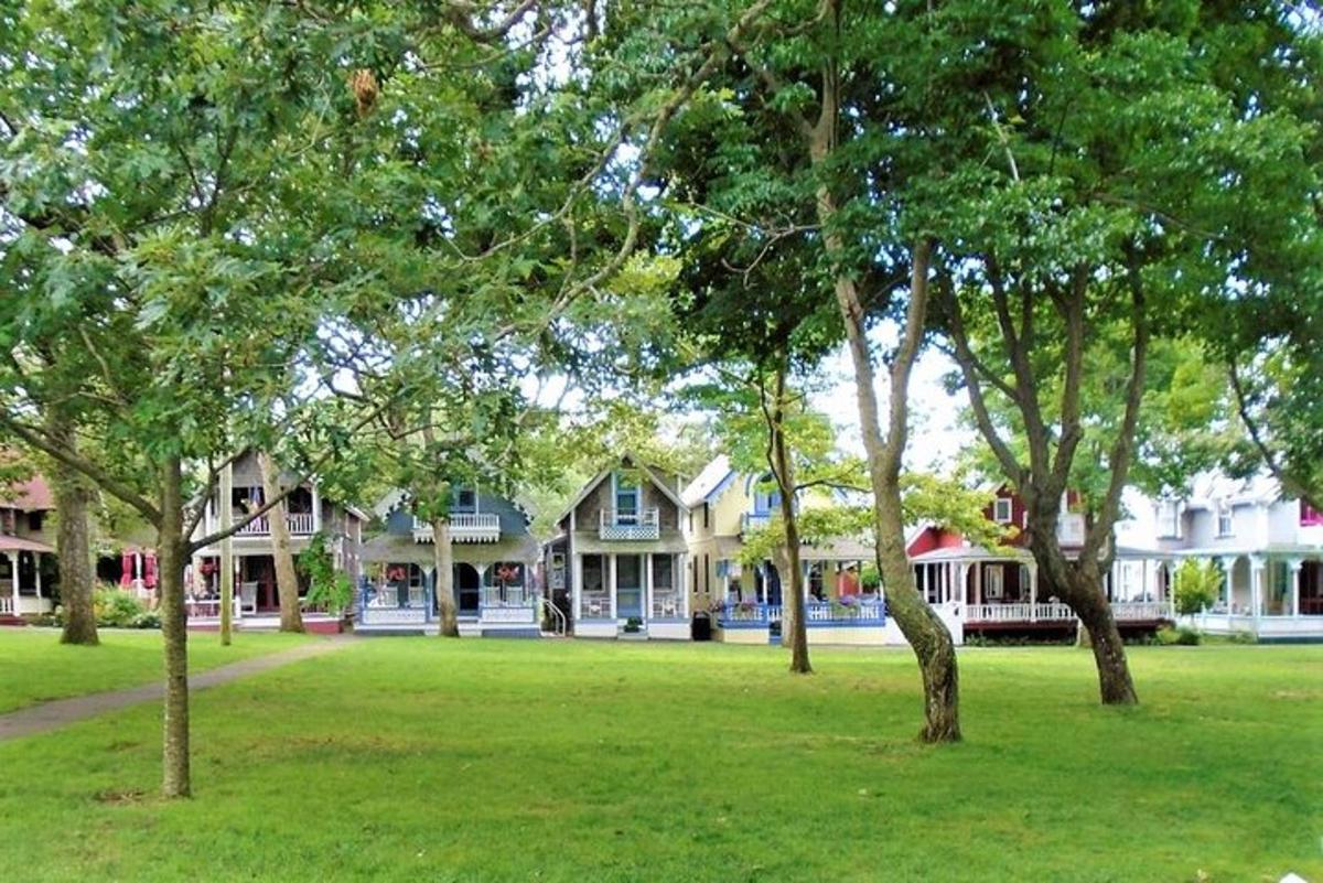 a large house with trees in front of it