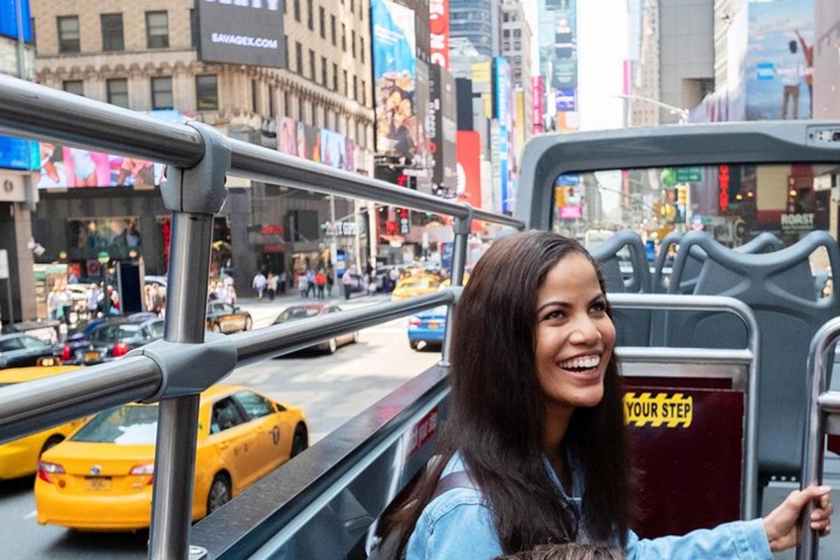 a woman is smiling on a city street