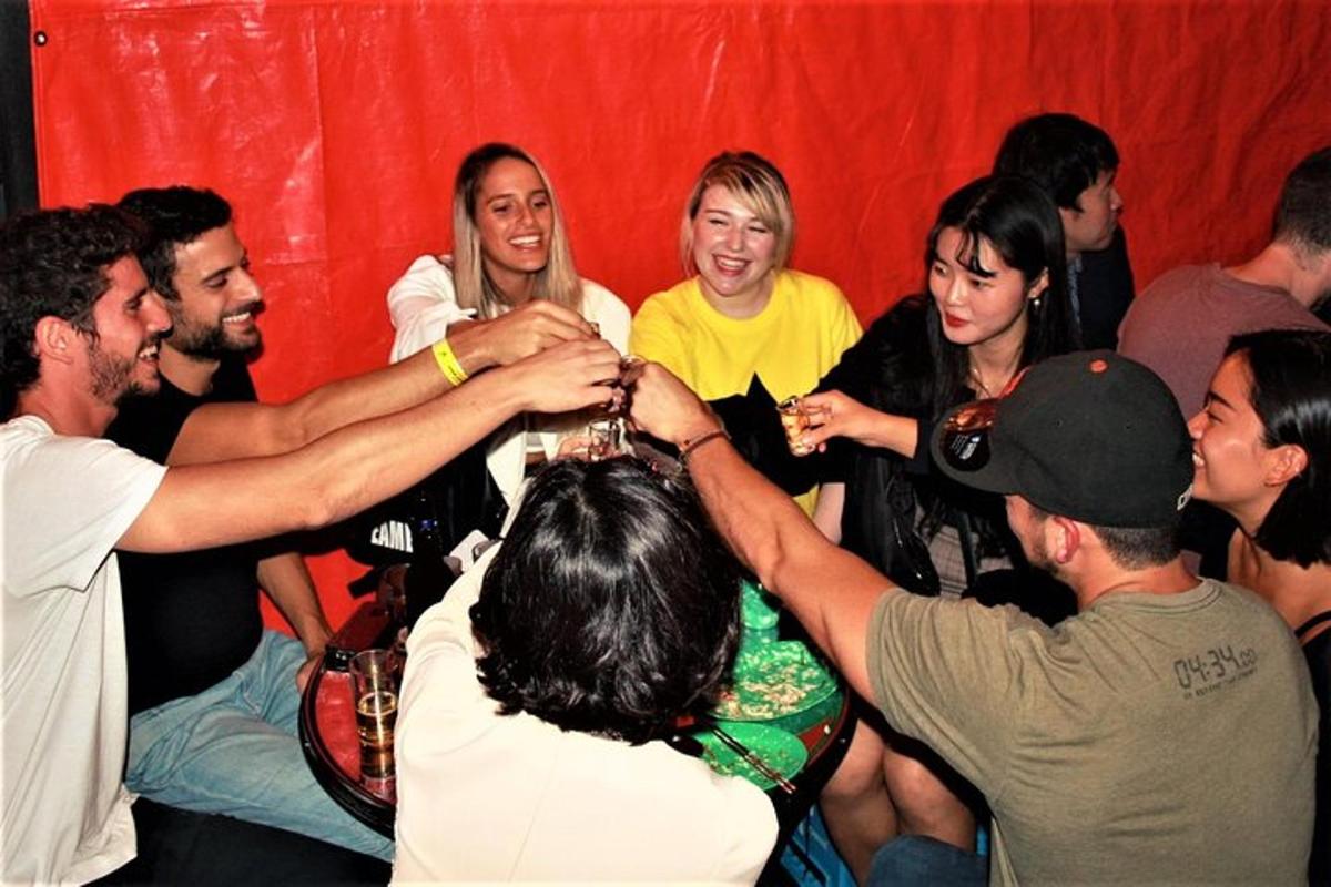 a group of people standing around in a room