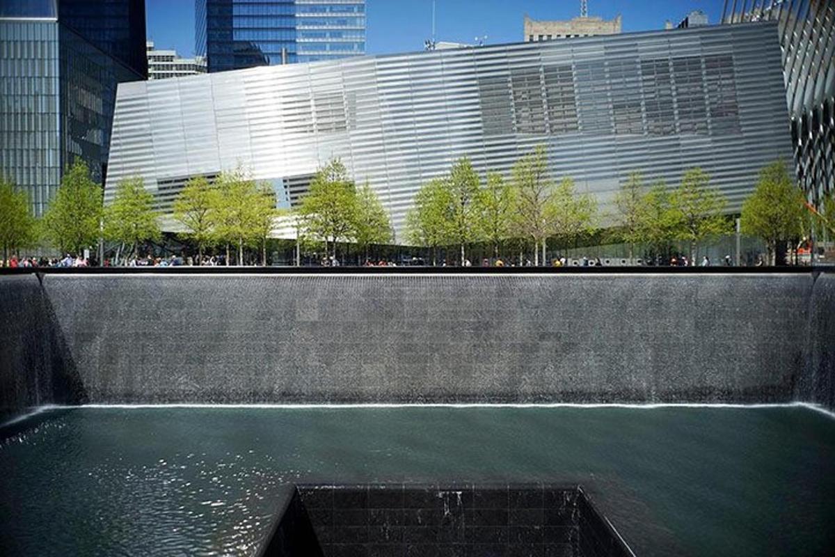 a pool of water in front of a large building