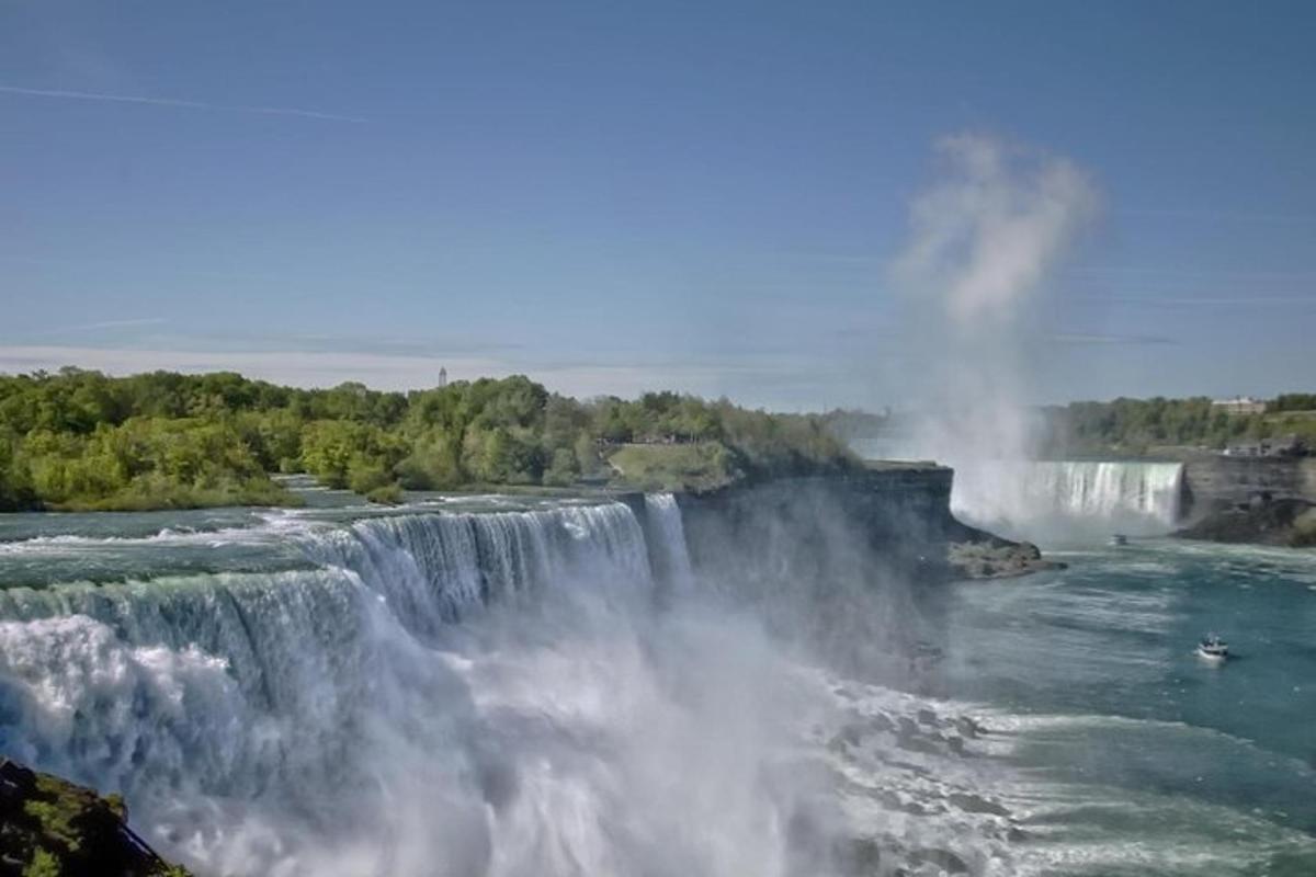 a waterfall in the middle of a river
