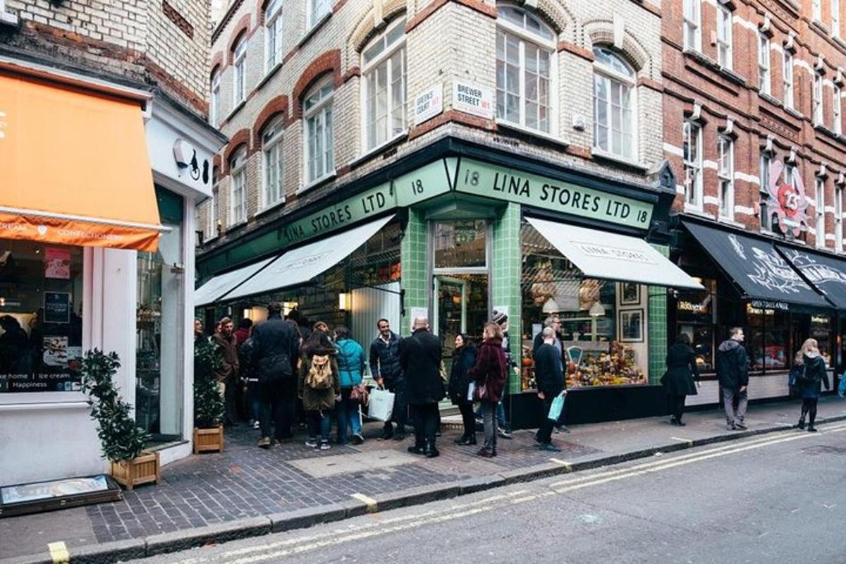a group of people standing in front of a store