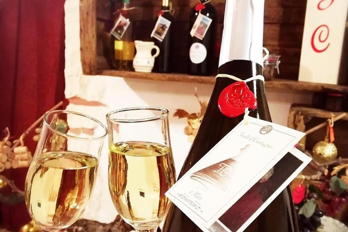 a bottle of wine and two glasses on a table