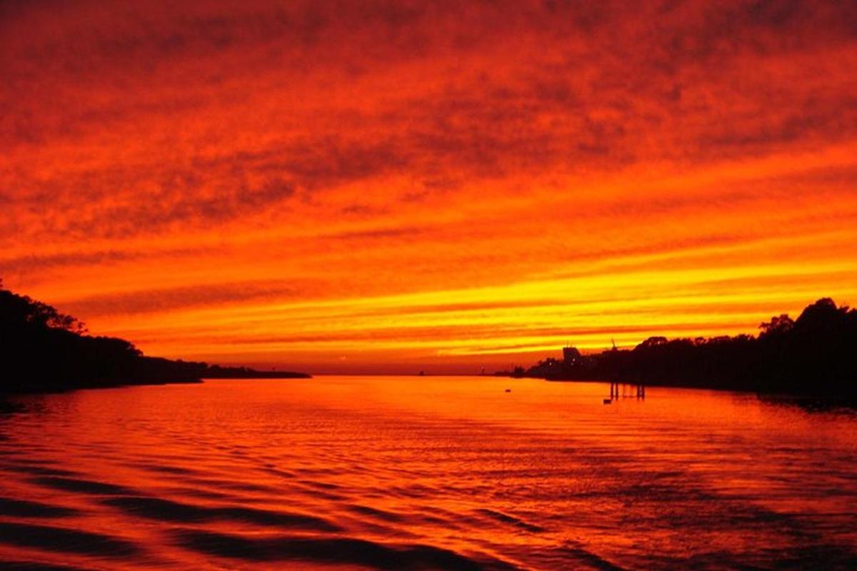 a sunset over a body of water