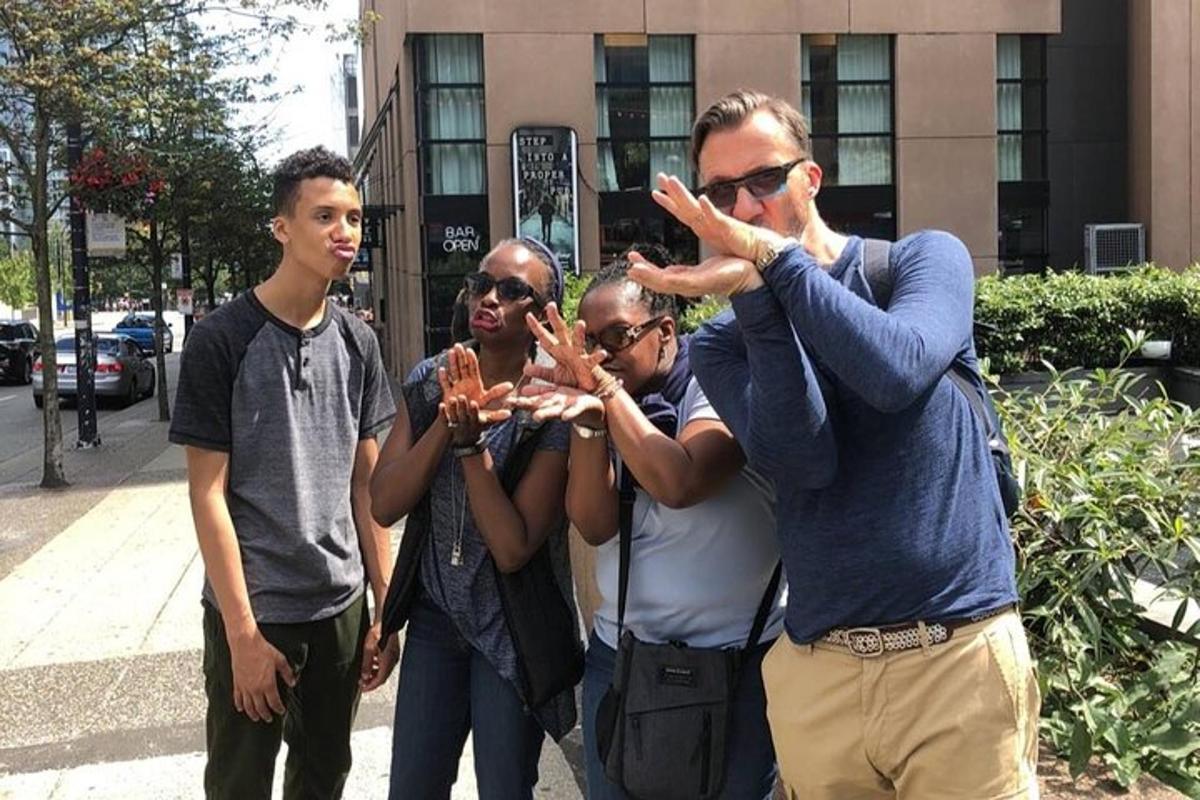 a man taking a picture of a group of people