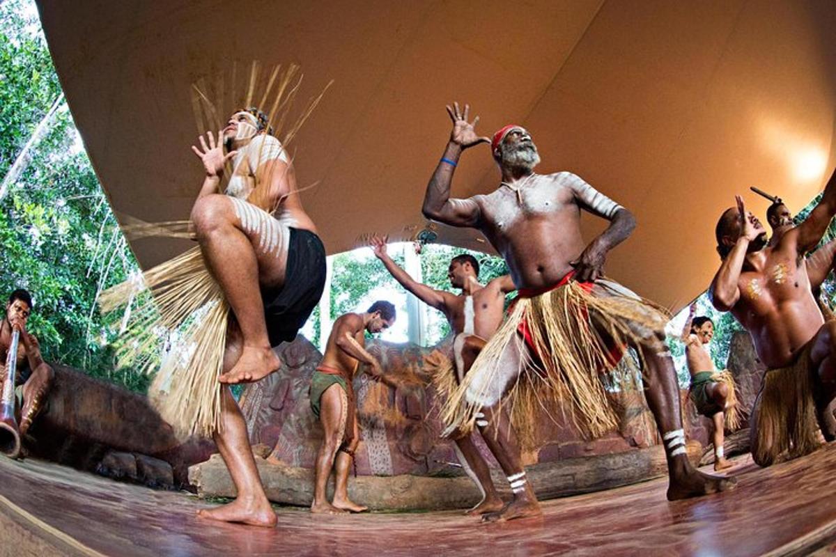 a group of men performing a show on a stage