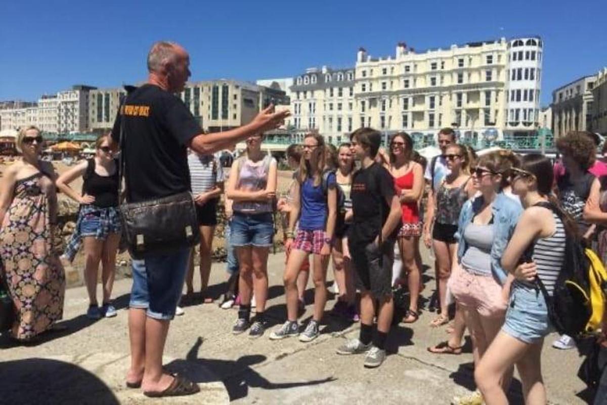 a man standing in front of a group of people