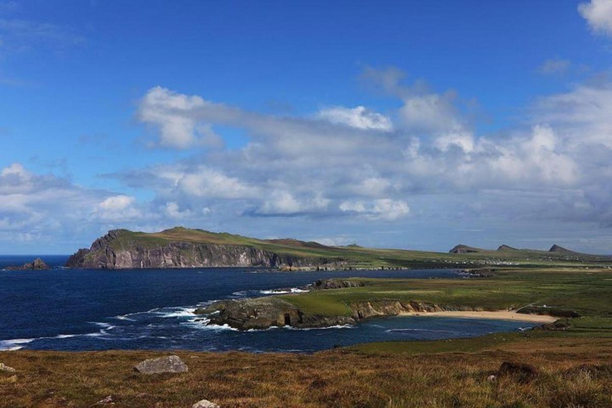 a view of the ocean with a rocky island
