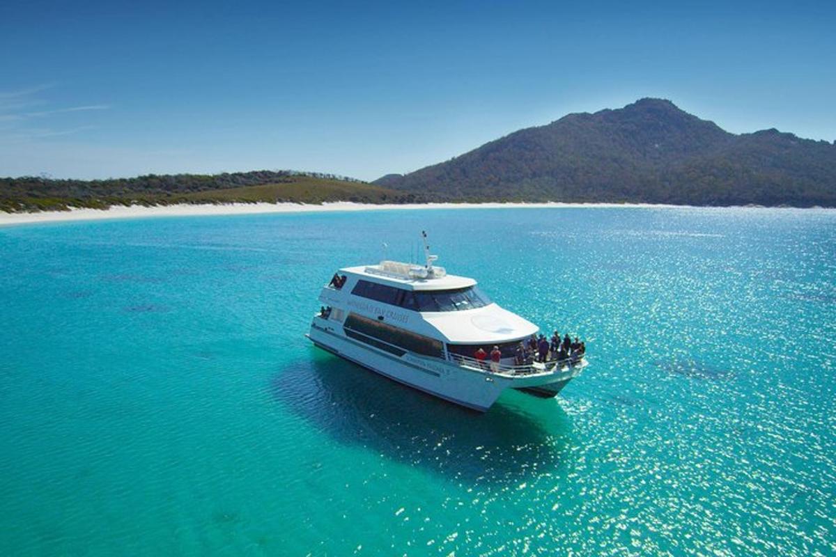 a boat in the middle of a large body of water
