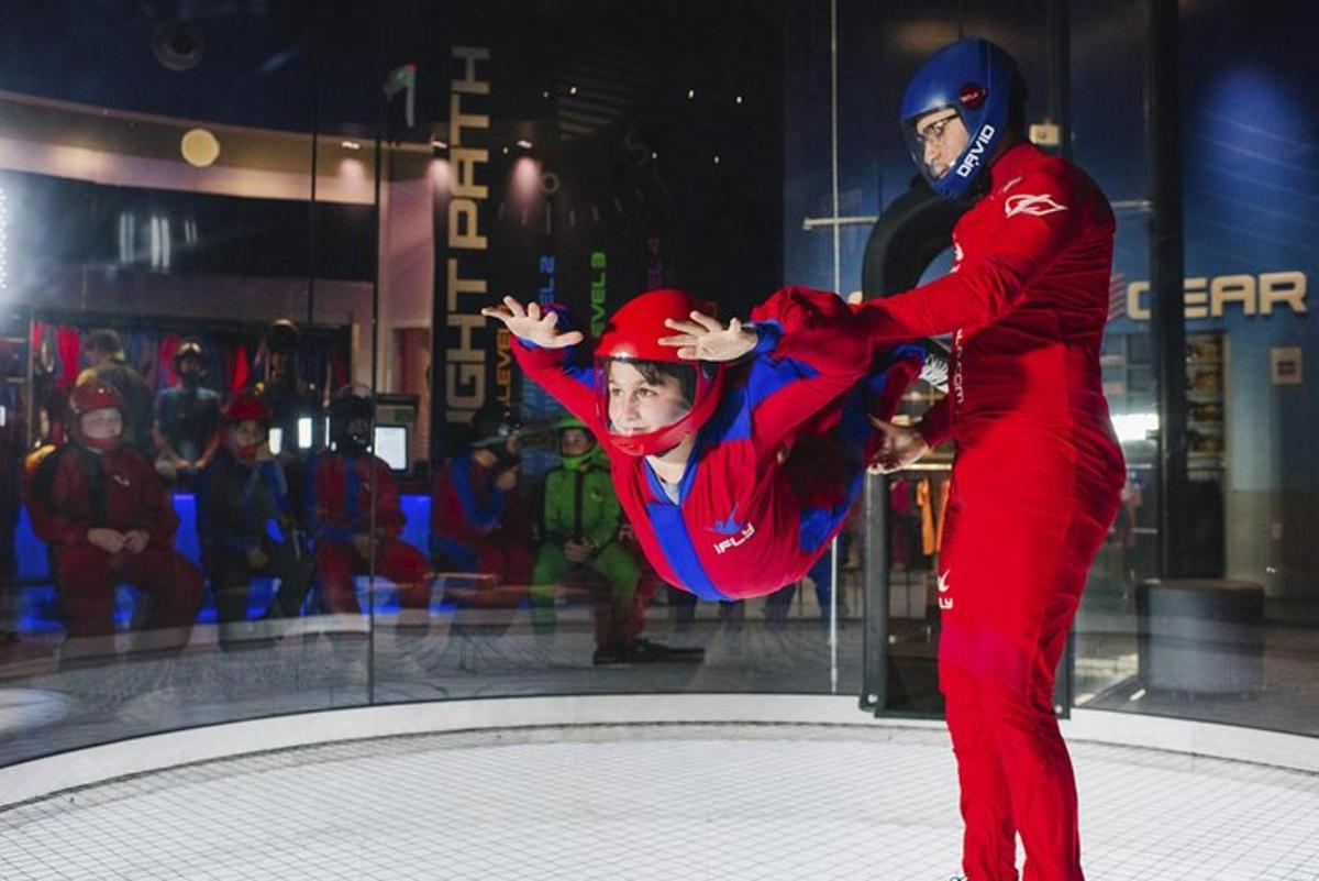 a man and a woman in red are dancing