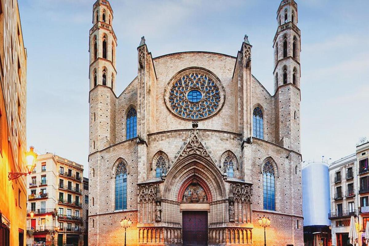 a large church with two towers on a street