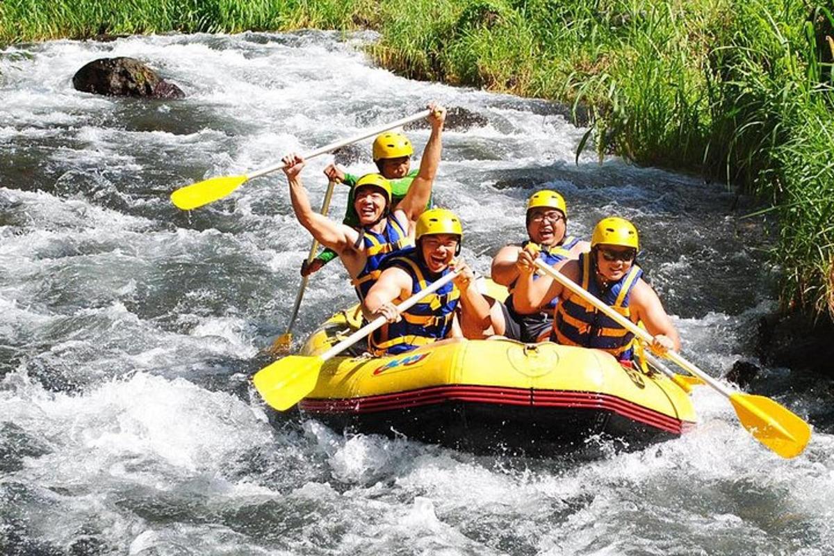 a group of people in a raft on a river