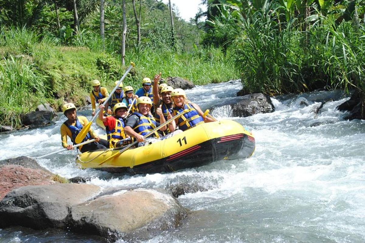 a group of people in a raft in a river
