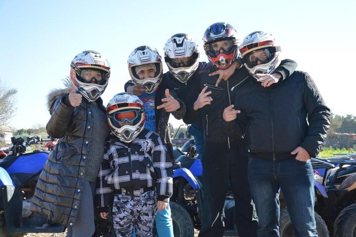 a group of people wearing helmets posing for a picture