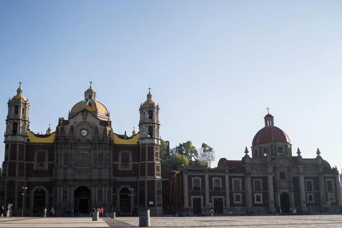 a large building with two domes on top of it