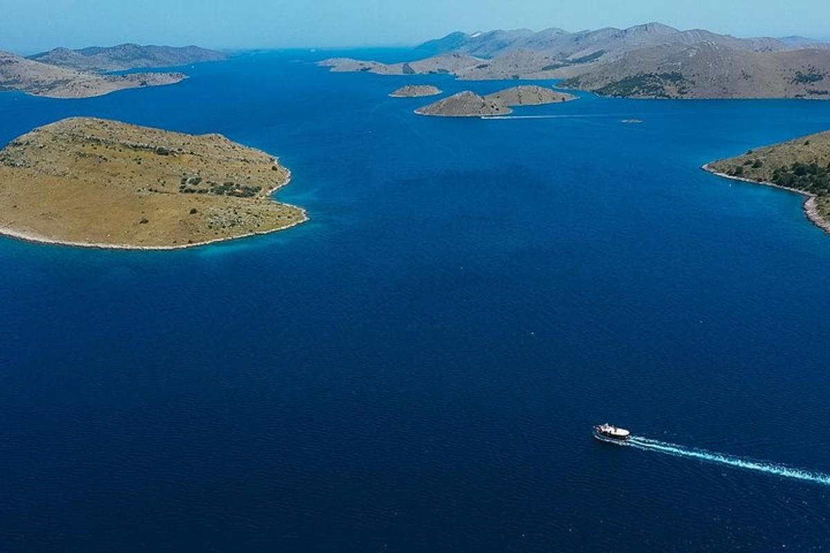 a boat in the middle of a large body of water