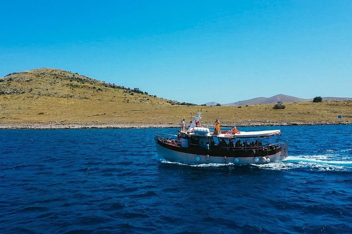 a boat in the water with people on it