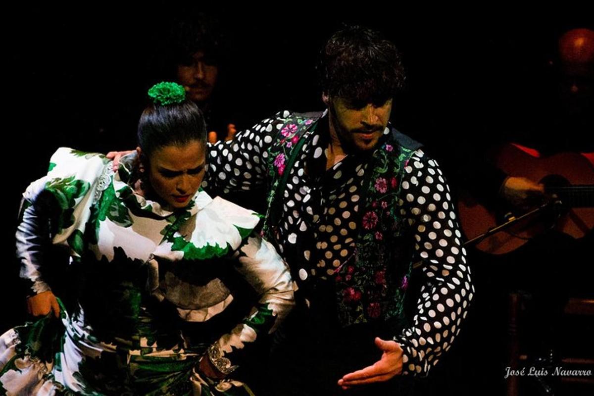 two men dressed in costumes on a stage